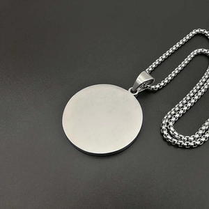 Brushed silver stainless steel round pendant necklace with a fine square box chain link