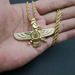 Golden Faravahar pendant necklace with twisted rope chain in a handheld display