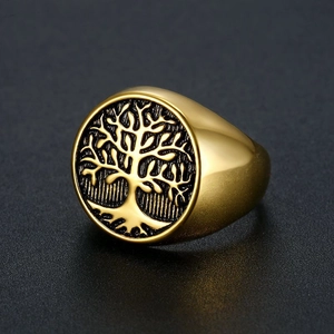 Detailed macro view of the gold plated Tree of Life signet ring with an antique finish