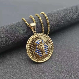 Gold-plated stainless steel Pharaoh pendant necklace with blue enamel on gray display