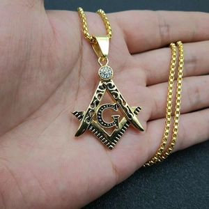 Gold plated Masonic square and compass pendant necklace with iced out diamond details