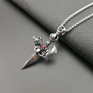 Vintage punk titanium steel pestle necklace with red gemstone on black leather background