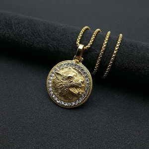 Gold wolf head medallion pendant necklace with round box chain and pavé crystal border