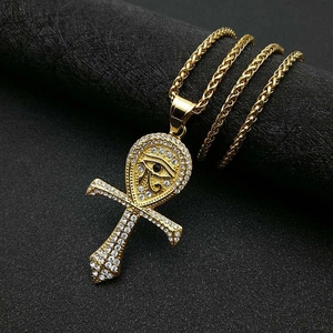Collier Ankh hip hop plaqué or avec Œil d'Horus et cristaux étincelants