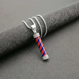 Barber pole pendant necklace with red blue white spiral pattern and crystal accents