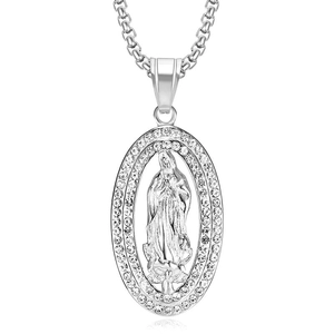 Macro detail of silver Virgin Mary pendant with sparkling rhinestone frame and steel chain