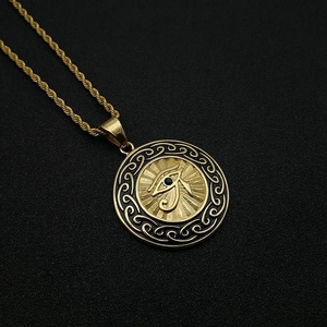 Gold plated Eye of Horus necklace with crystal inlay and twisted chain for unisex wear