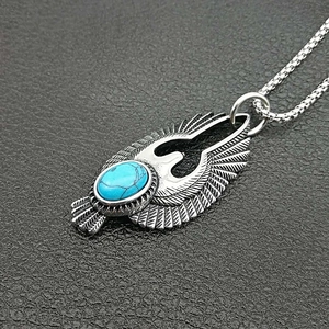 Vintage 316L stainless steel eagle feather pendant with blue turquoise on a box chain