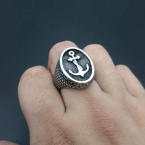 Vintage stainless steel signet ring with anchor relief and honeycomb texture