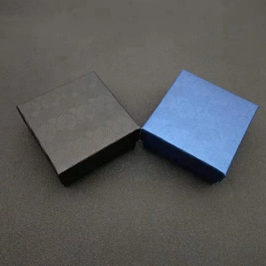 Square jewelry gift boxes in black and navy blue with textured shell pattern finish