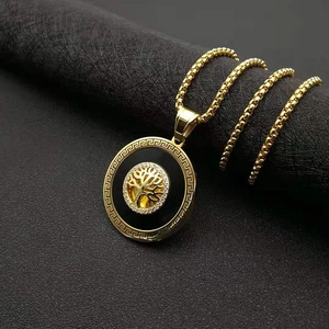 Gold-plated tree of life pendant necklace with cubic zirconia and Greek key pattern