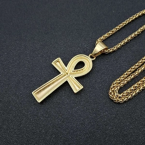Collier pendentif croix Ankh dorée pour hommes et femmes avec chaîne blé sur fond noir