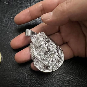 Silver Anubis pendant necklace with pyramid and all-seeing eye detail on black leather