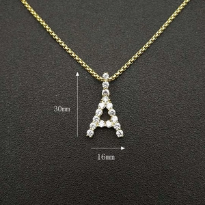 Macro shot of 18K gold plated letter A pendant with AAA zircon pave and dimensions
