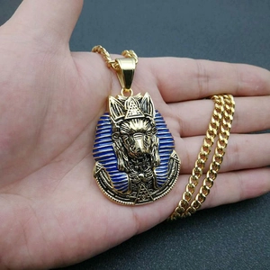 Vintage Egyptian Anubis pendant necklace in gold-plated steel with blue enamel