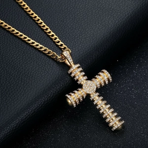Hip hop gold plated cross pendant necklace with full cubic zirconia on a Cuban link chain
