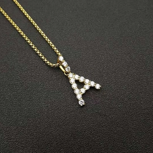 Detailed close-up of 316L stainless steel gold-plated letter A pendant with AAA zircon