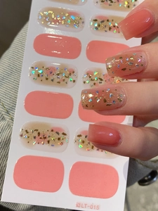 Macro detail of LT-015 pink gradient nail stickers with gold foil and laser sequins