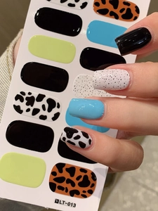 Detailed view of colorful leopard print and solid color self-adhesive nail sticker set
