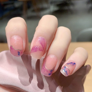 Pink and purple marble press-on nails with silver glitter and gold metallic lines