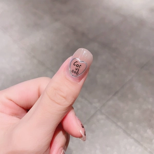 Cat-themed jelly pink gel nail stickers with silver heart outline and black text art