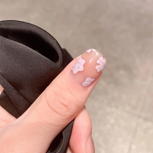 Taro purple smiley nail stickers with floral patterns and glossy waterproof finish