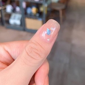 French nude pink nail stickers with silver glitter and iridescent shell flake accents