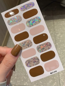 Brown sequin full wrap nail polish stickers showing solid tones and glitter detail