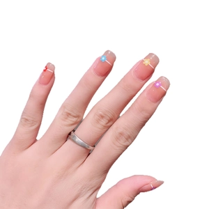 Waterproof French nude pink nail wraps with colorful floral patterns and white tips