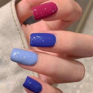 Glossy gradient nail stickers in pink, royal blue, and purple with a mirror finish texture