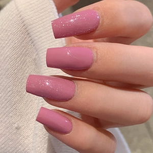 Long ballet style press-on nails in glittery dusty rose pink with glossy finish