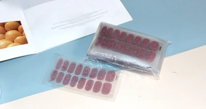 Detail showing pink glitter nail polish wraps CS-037 in single and bulk packaging