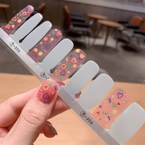 Haze blue gel nail stickers with colorful hand-drawn graffiti heart and flower patterns