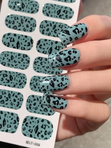 Detail of Morandi blue self-adhesive nail stickers with black leopard pattern and model LT-059