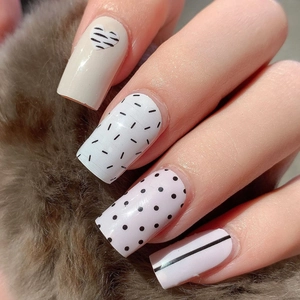 Minimalist Valentine's nail stickers featuring heart patterns and stripes on faux fur
