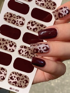 Detailed view of LT-023 dark brown leopard print and red self-adhesive nail stickers