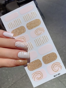 Detail of pink and gold glitter nail stickers with abstract swirls and stripes design