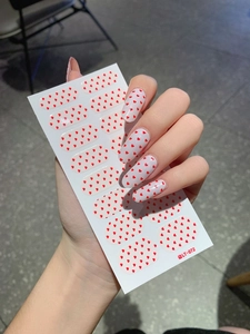 Detail of eco-friendly Valentine's red heart nail stickers on white base, model LT-072