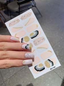 Detail of LT-055 nail stickers with pink base, gold glitter, and stone texture patterns