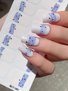Detail of self-adhesive nail sticker LT-063 with purple waves and black polka dots