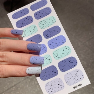 Easter spotted nail stickers in purple, blue and green with realistic eggshell texture