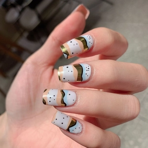 Self-adhesive nail stickers with gold foil wave patterns and geometric art design