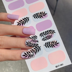 Artistic leafy nail art stickers in soft pink and purple tones with model display