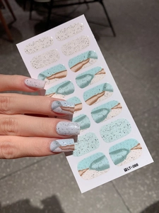 Detail of LT-066 blue marble nail wraps with abstract ink texture and gel finish