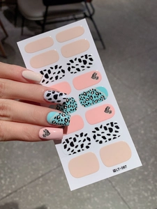 Detailed sheet of LT-067 nail wraps featuring heart patterns and leopard prints