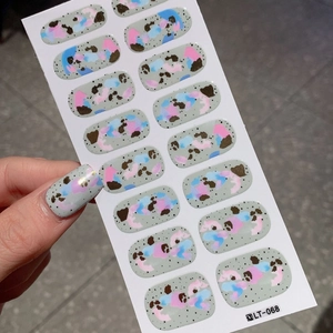 Artistic graffiti nail wraps in Morandi grey with colorful abstract ink splash design