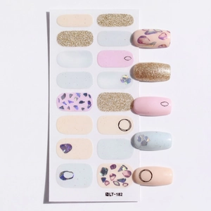 Artistic minimalist nail stickers with floral patterns and gold glitter accents