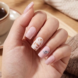 Waterproof long ballerina press-on nails with pink glitter and maple leaf patterns