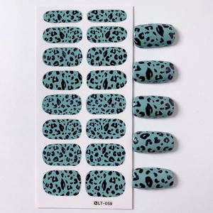 Modern mint green animal print nail stickers with black leopard patterns and gloss finish