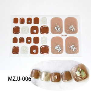 Detailed view of 5D glitter toe nail stickers with rhinestones and shell fragments